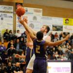 Boys basketball: Vikings wear down Wolves for league lead