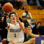 Boys basketball: Vikings wear down Wolves for league lead