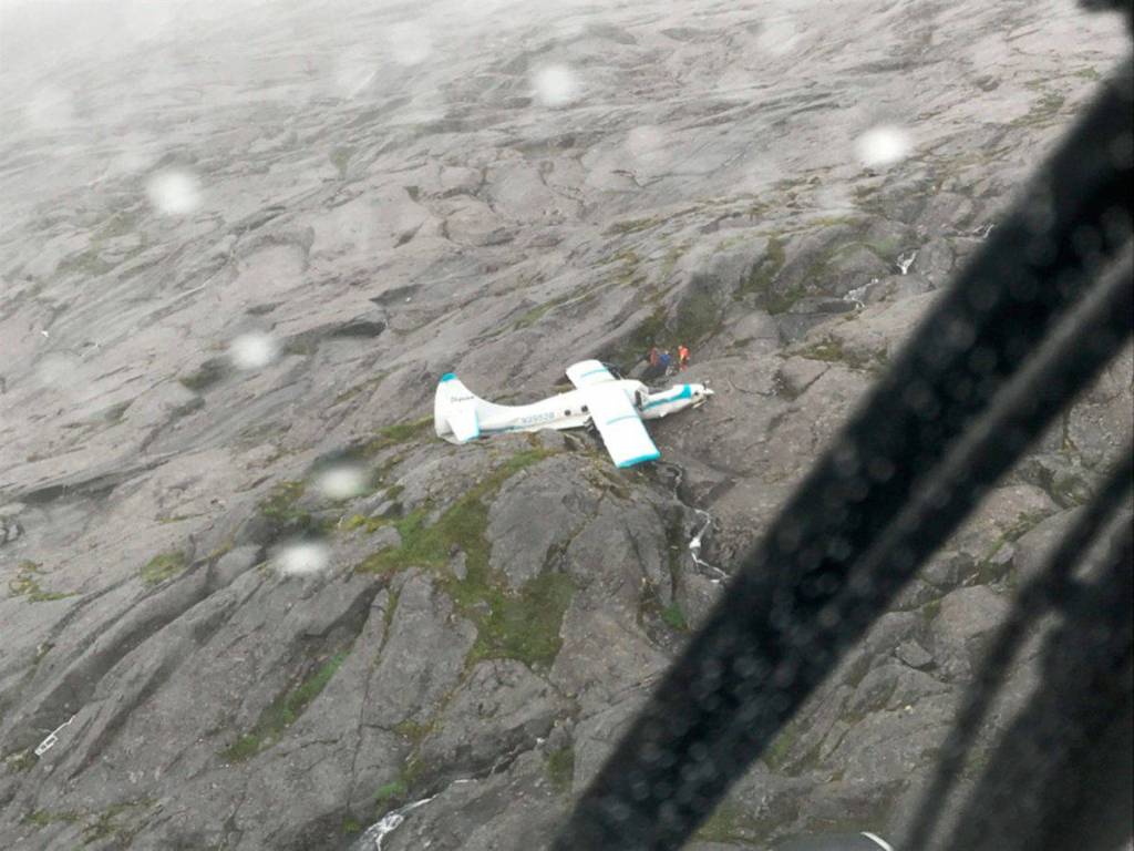 Eleven people were rescued including a Sequim man and his brother 39 miles southwest of Ketchikan, Alaska on July 10, after their plane crashed. Two Coast Guard Air Station Sitka MH-60 Jayhawk helicopter crews took the victims to a staging area nearby for further transfer to Ketchikan. Photo courtesy of U.S. Coast Guard