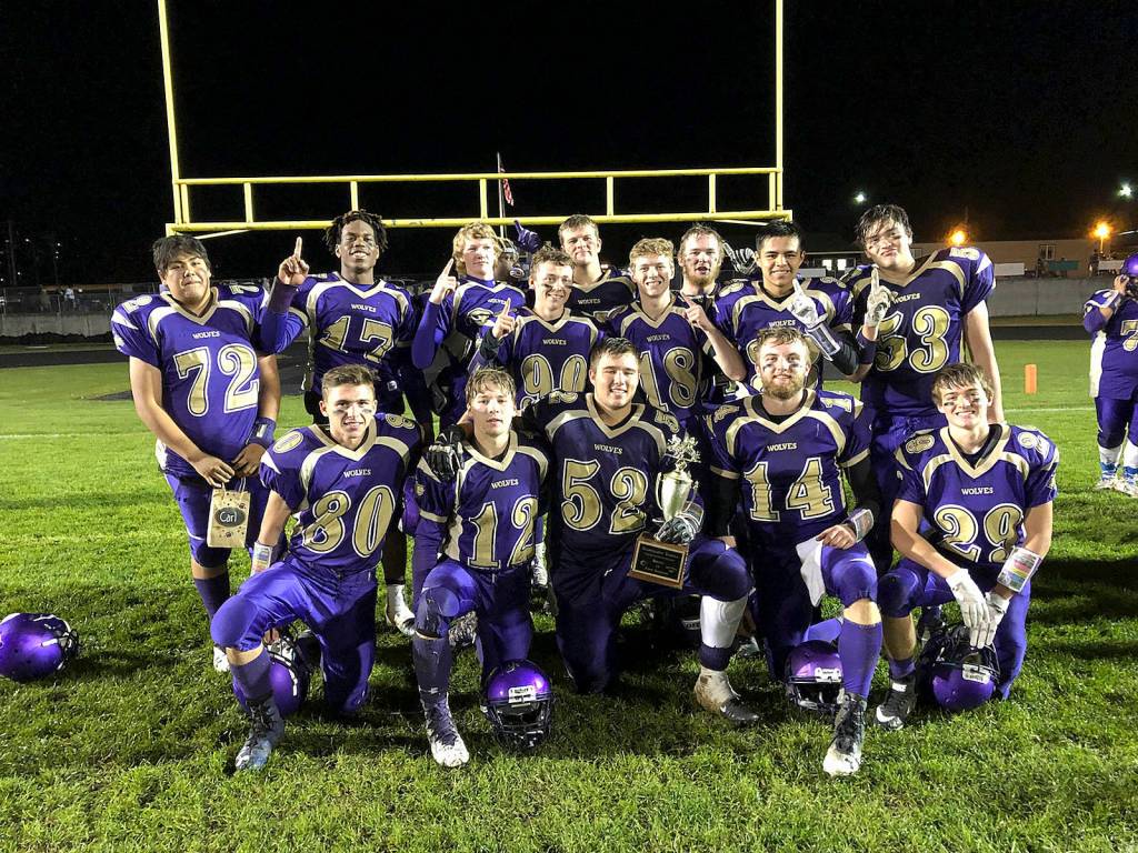 SHS football seniors celebrate another big rivalry win over Port Angeles. Photo by Diana Thompson Young