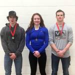 Sequim wrestlers, from left, Jamie Schroepfer, 132 pounds, Kiara Pierson, 135 pounds, and Ben Newell, 145 pounds, earned high seeds at their regional tournaments and earned spots at the state MatClassic on Feb. 9-10. Photo courtesy of Bill Schroepfer