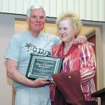 Walt Schubert and wife Sherry accept their 2018 Citizen of the Year award at a Sequim-Dungeness Valley Chamber of Commerce event in February of 2009. Walt Schubert died on Dec. 22. Sequim Gazette file photo by Michael Dashiell