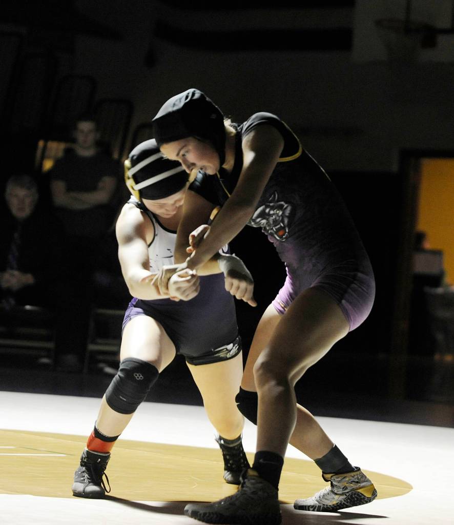 Sequims Amara Sayer, right, takes on top-ranked Holly Beaudoin of North Kitsap on Dec. 12. Sequim Gazette photo by Michael Dashiell