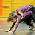 Amara Sayer, bottom, and Alexi Rampp-Taft work on some moves in a late December practice. Sequim Gazette photo by Michael Dashiell