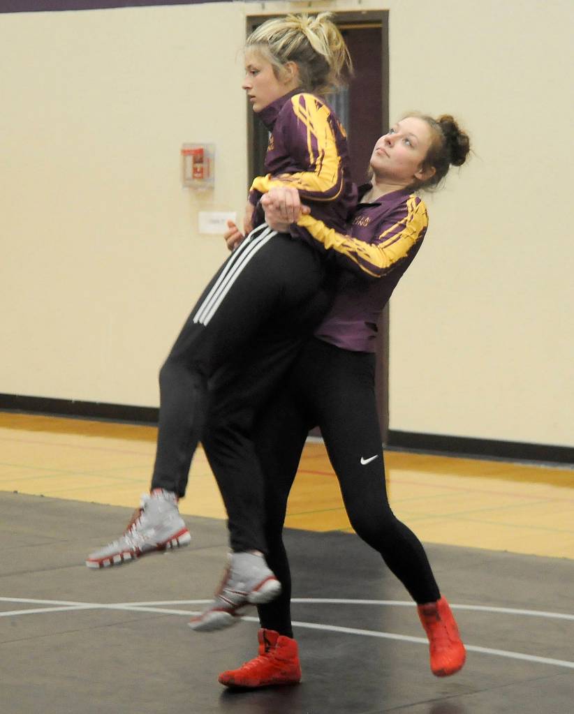 Emily Dodson, left, and Kaydence Hilliard get some practice time in at the Sequim Community School gymnasium in late December. Sequim Gazette photo by Michael Dashiell