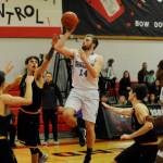 Sequim forward Riley Cowan drives the lane for two of his game-high 27 points in a 61-59 win over Ferndale on Dec. 28. Sequim Gazette photo by Michael Dashiell