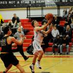 Sequim guard Kyler Rollness drives to the basket in the second half of a win against Ferndale on Dec. 28 in Port Townsend. Rollness finished with 11 points. Sequim Gazette photo by Michael Dashiell