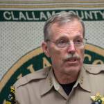 Clallam County Sheriff Bill Benedict answers questions about the triple homicide near Port Angeles during a press conference Tuesday. (Jesse Major/Peninsula Daily News)