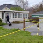 Sgt. John Southard with Sequim Police Department enters the Sunbelt Apartments on Thursday morning during an investigation into the death of a 57-year-old Sequim resident. Sequim Gazette photo by Matthew Nash