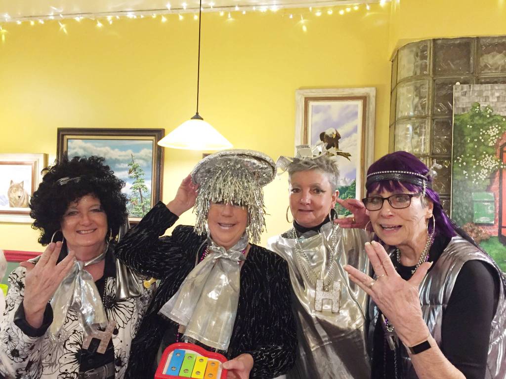 The Whodunnit Downtown? Harmonia band includes Koros (Cindy Weston), Elpis (Anne Burkhardt), Pax (Kelly Olson) and Arcus (Mary Higley). Photo by Renne Emiko Brock