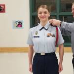 Madeline Patterson getting her new rank insignia from her father Jake on Jan. 8. Photo courtesy of Danielle Patterson