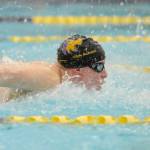 Kaleb Needoba swims the butterfly portion of the 200 medley relay as Sequim takes on North Kitsap last week. Sequim set a school and pool record with a 1:51.07 finish. Sequim Gazette photo by Michael Dashiell