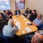 In back center, U.S. Rep. Derek Kilmer, D-Gig Harbor, meets with members of the Hurricane Ridge Winter Sports Club, which has been unable to open the Hurricane Ridge Ski and Snowboard Area due to the partial federal shutdown. Photos by Jesse Major/Peninsula Daily News