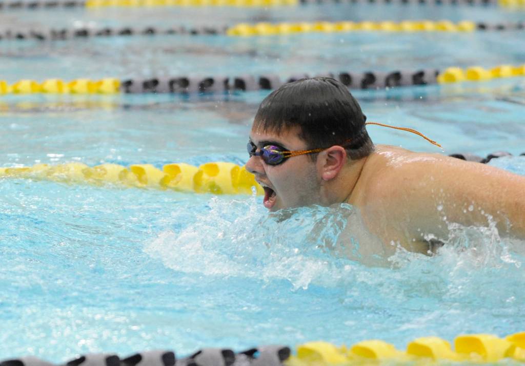 Anthony Porrazzo swims the 100 butterfly as the Wolves take on Bremerton on Jan. 24. Sequim Gazette photo by Michael Dashiell