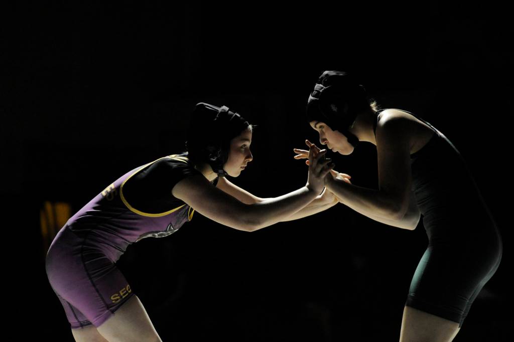 Sequims Skye Henning takes on Port Angeles grappler Tatum-Mae Edmondson at 135 pounds on Jan. 17. Sequim Gazette photo by Michael Dashiell