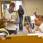 A new agreement between the City of Sequim and Clallam County Fire District 3 allows for more joint emergency training and job sharing during an incident at the Emergency Operations Center in the Sequim Transit Center, seen here in June 2016 with Sequim City Manager Charlie Bush, Sequim Police Chief Sheri Crain and Fire Chief Ben Andrews. Sequim Gazette file photo by Matthew Nash