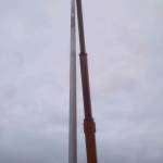 Ben Smith of Maple View Dairy Farms helps repair the broken flag pole in front of the Sequim VFW Post 4760 after the December windstorm broke it. Photo courtesy of Bill Strehle