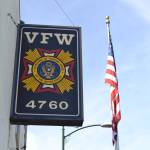 Volunteers help Old Glory fly again at VFW