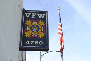 Volunteers help Old Glory fly again at VFW