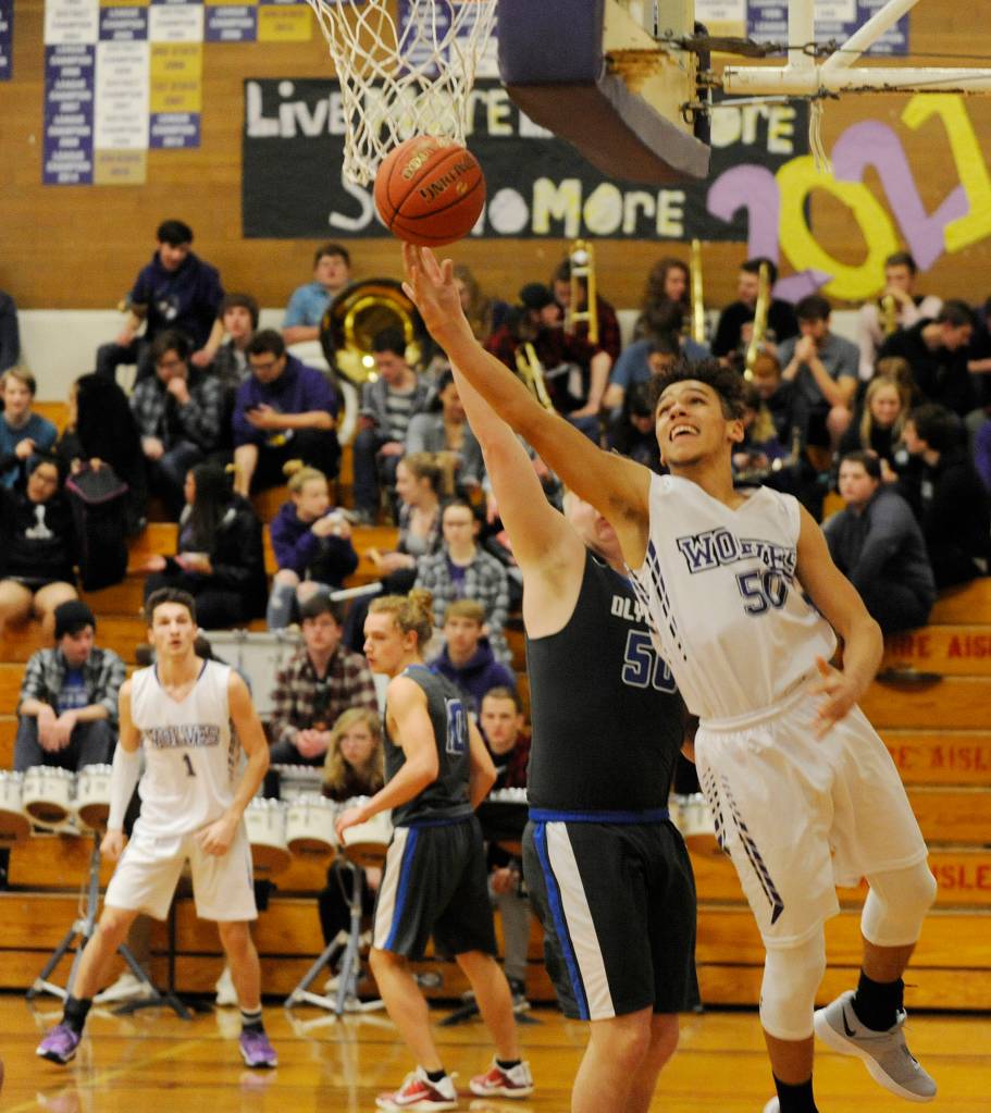Sequim post Hayden Eaton goes to the basket in the first half of a 51-47 Sequim victory on Jan. 29. Sequim Gazette photo by Michael Dashiell
