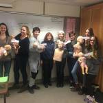 Olympic Peninsula Academy students (from left) Melanie Byrne, Cadence Puhrmann, Abram Yeater, (Sandy Boudrou of Fire District 3), Payton Johnson, Faith Amaya, Mia Coffman and Alyssa Alcaraz show off their certificates after completing CPR training. Submitted photo