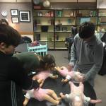 Olympic Peninsula Academy students practice CPR for infants. Submitted photo