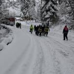 Due to snowy conditions, crewmen with Clallam County Fire District 3 carry an 85-year-old man to an SUV in order to airlift him to Seattle for care. Photo courtesy of Clallam County Fire District 3