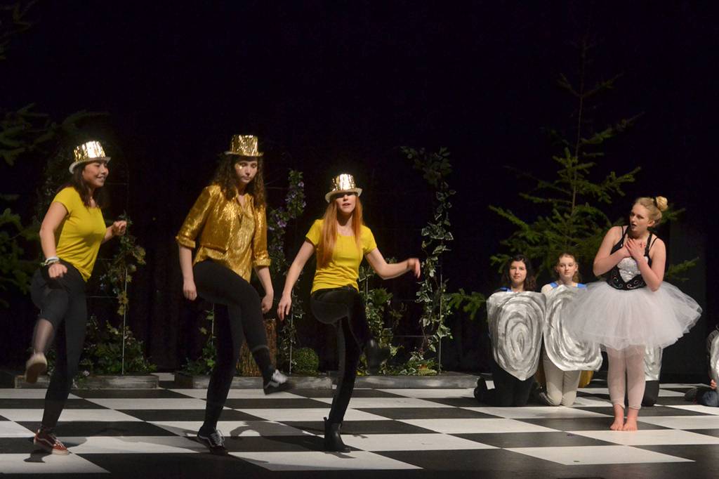 The Sun (Khelea Cloetens, Arlene Law and Annika Christensen) and the Moon (Allison Van De Wege) hold a dance-off in Through the Looking-Glass that runs Feb. 27-March 2 at Sequim High School. Sequim Gazette photo by Matthew Nash