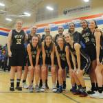 Sequims girls basketball squad celebrates a come-from-behind win over Foster in Auburn on Feb. 22, sending the Wolves to the state 2A tourney in Yakima this week. They include (back row, from left) LeeAnn Raney, Amanda Weller, Melissa Porter, Kalli Wiker, Hope Glasser, Jayla Julmist and Abby Schroeder, with (front row, from left) Bobbi Sparks, Jessica Dietzman, Riley Pyeatt and Hannah Wagner. Sequim Gazette photo by Michael Dashiell