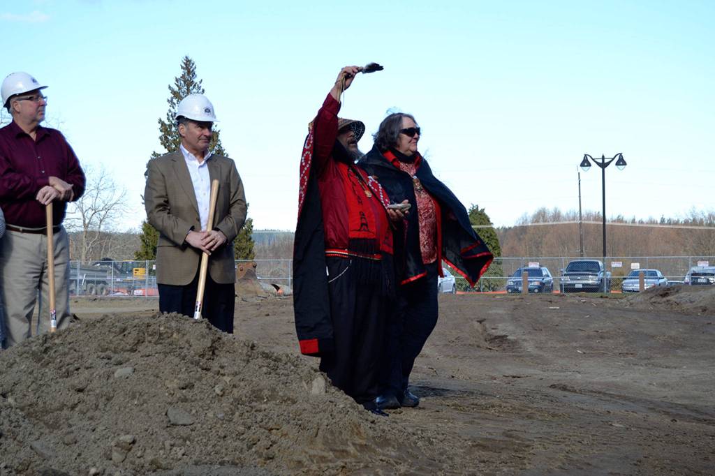 Patrick Adams, a spirital leader for the Jamestown SKlallam Tribe, blesses the new resort expansion in Blyn with his wife Patsy prior to breaking ground on the property.