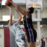 Sequims Jayla Julmist, right, blocks a shot by Port Angeles Jaida Wood in the teams class 2A state tourney match-up on Feb. 27. Despite 19 points, 19 rebounds and three blocks by the SHS sophomore, Sequim fell to the Roughriders, 57-47. Sequim Gazette photo by Michael Dashiell