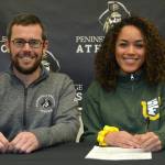 Kanyon Anderson, Peninsula College womens soccer head coach, joins Halle Watson last week as she signs a letter of intent to play for the University of San Francisco Dons, a Division I school. Photo courtesy of Peninsula College