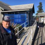 Stephen Rosales, president of the Sequim Food Bank board, stands outside the facility on Alder Street, where technicians with Security Services Northwest recently installed new security equipment. Photo courtesy of Security Services Northwest, Inc.