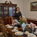 Serenity Thrift Store director Belicia Belle Muñoz cuts a ribbon on March 2 for the grand opening of the Designer Furniture Showcase and Bedroom Furniture Annex. Photo courtesy of the Sequim-Dungeness Valley Chamber of Commerce