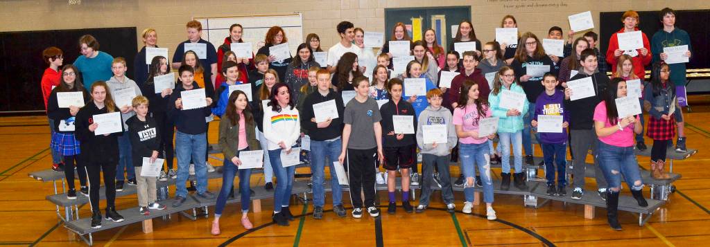 At a recent Honor Roll dessert, Sequim Middle School staff celebrate students who earned grade-point-averages of 3.00 or better for the First Semester. More than 400 students achieved this honor. The celebration was held in the schools gym with certificates and cookie reception. Way to go SMS students! principal Vince Riccobene said. Submitted photo