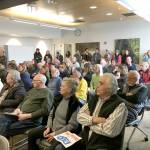 Audience members listen to a discussion on the Clallam County Public Utility Districts residential meter policy at the PUD headquarters in Carlsborg on March 11. Photo by Rob Ollikainen/Peninsula Daily News