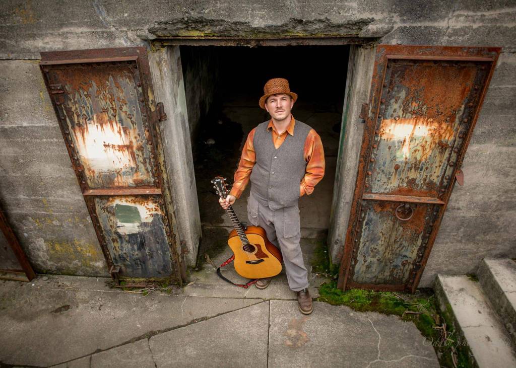 For a few years, Kalan Wolfe has played across the Olympic Peninsula and says he got his start playing open mic nights in Sequim while in high school. Photo by Oddly Photography