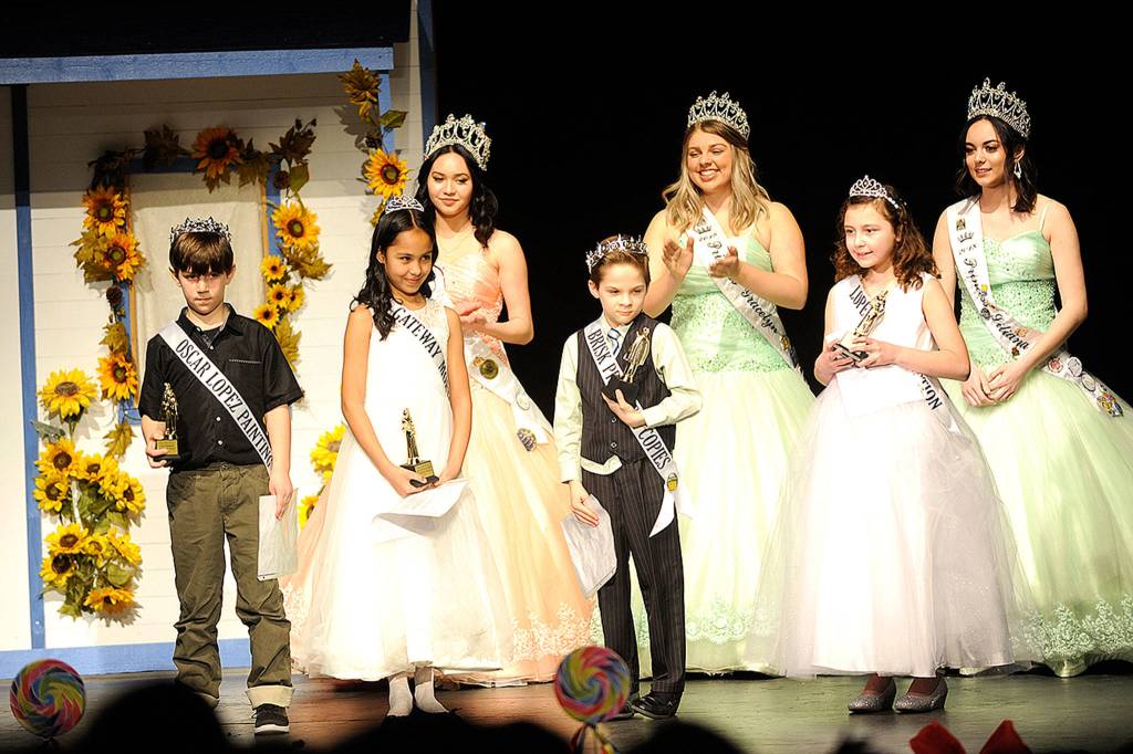 This years Irrigation Festival Junior Royalty, include, from left, Prince Cole Seamands, Princess Eva Lancheros Gillis, Prince Joshua Wakefield and Princess Maci Evans. They were crowned by last years royalty, from back left, Queen Erin Gordon, Princess Gracelyn Hurdlow and Princess Liliana Williams. Sequim Gazette photos by Matthew Nash