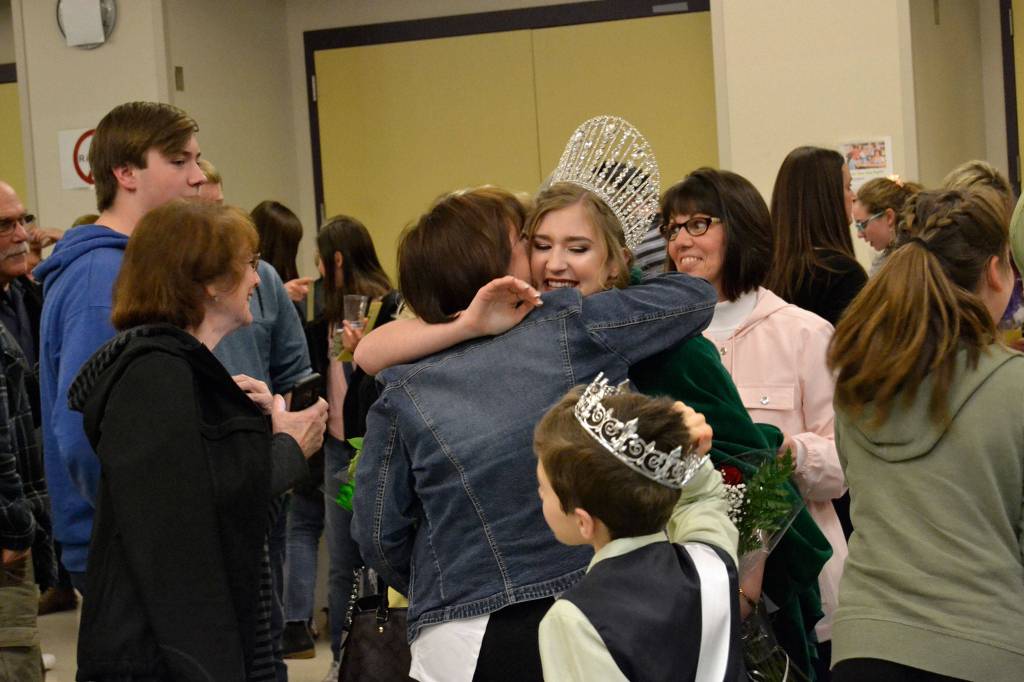 Emily Silva receives a congratulatory hug from her mom Julianne Coonts on March 14 after being crowned queen of the 2019 Sequim Irrigation Festival. Previously, Silva said being on the court would mean a lot to her mom because she was a festival queen, too.