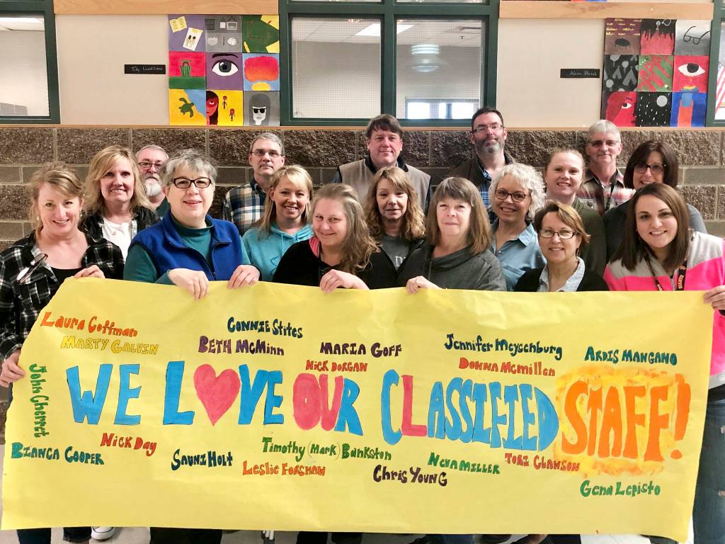 Sequim Middle School celebrates its classified staffers. Pictured are (back row, from left): Marty Galvin, Mark Bankston, Nick Day, Nick Dorgan and John Cherrett, with (middle row, from left) Beth McMinn, Sauni Holt, Lesli Forshaw, Connie Stites, Jenny Meyensburg and Ardis Mangano, and (front row, from left) Laura Coffman, Donna McMillen, Bianca Cooper, Neva Miller, Toni Clawson and Gina Lepisto. Submitted photo