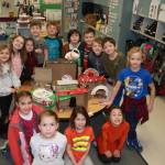 Students in Melissa Withrows first-grade class at Greywolf Elementary prepare Leprechaun traps for St. Patricks Day. Photo by Darcy Lamb