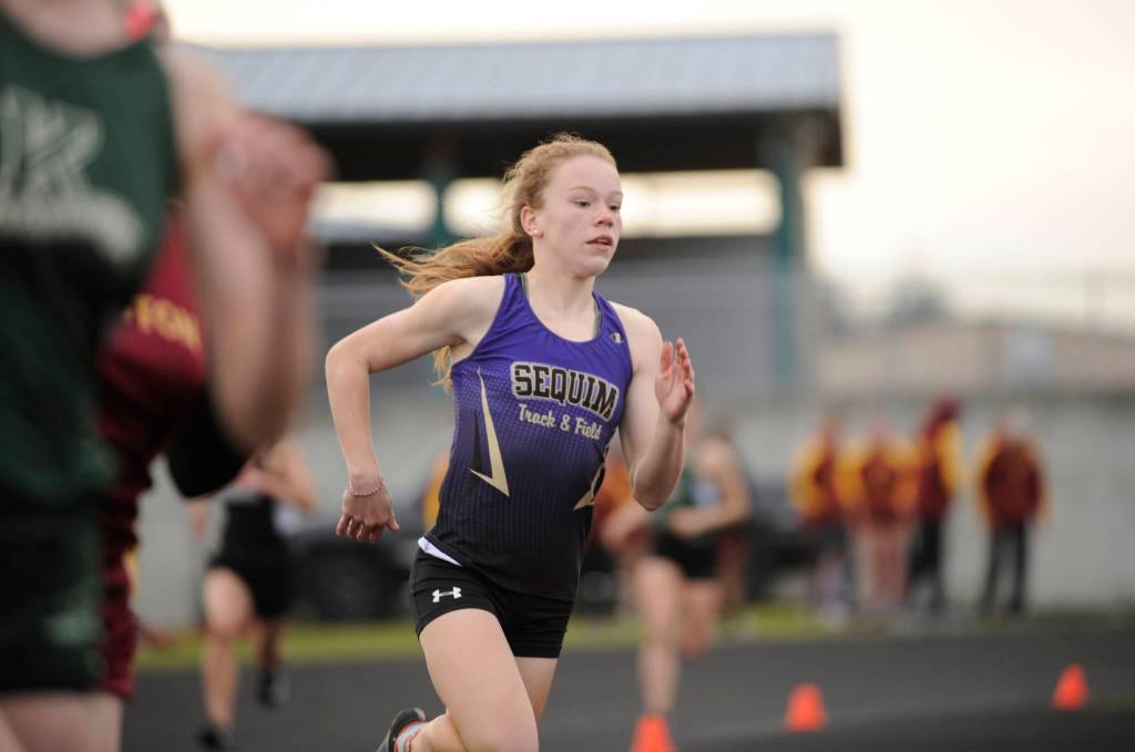 Sequims Riley Pyeatt races to a strong start in the 400-meter race on March 21 in Sequim. Pyeatt won the event and two other individual races (100, 200) at the Olympic League meet. Sequim Gazette photo by Michael Dashiell
