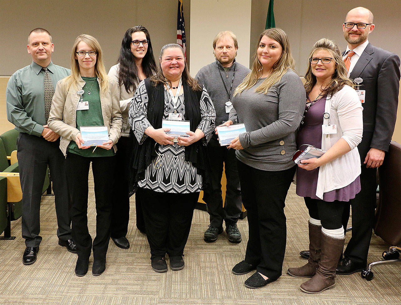 Pictured, from left, are OMC board president John Nutter, Central Registration representative Meghan McHenry, Central Access Charge Review representative Alyssa Luciano, Central Access Authorization representative Tracy Camp, Central Access representatives Bryan Bell, Melinda ONeel and Nikki Brown, and OMP Chief Physician Officer Josh Jones. Not pictured is medical assistant apprentice Felicia Hayward. Submitted photo                                Pictured, from left, are OMC board president John Nutter, Central Registration representative Meghan McHenry, Central Access Charge Review representative Alyssa Luciano, Central Access Authorization representative Tracy Camp, Central Access representatives Bryan Bell, Melinda ONeel and Nikki Brown, and OMP Chief Physician Officer Josh Jones. Not pictured is medical assistant apprentice Felicia Hayward. Submitted photo