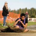 Sequim High senior Rigo Langston stretches for a solid mark in the long jump at last weeks Flying A meet in Port Angeles. Langston had a personal best 16-6.5 effort in the event, good for 12th overall. Sequim Gazette photo by Michael Dashiell