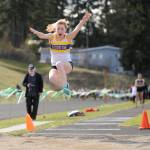 With a 14-2 mark  a personal best  Sequims Daisy Ryan places fifth in the long jump at the March 28 Flying A track meet in Port Angeles. Sequim Gazette photo by Michael Dashiell