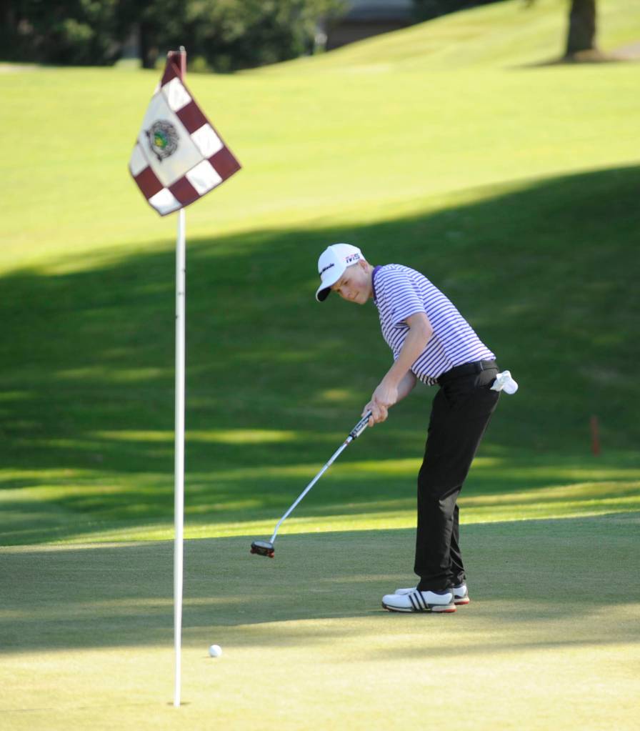Ben Sweet looks to sink a putt on the 10th hole at The Cedars at Dungeness on March 26. Sequim Gazette photo by Michael Dashiell