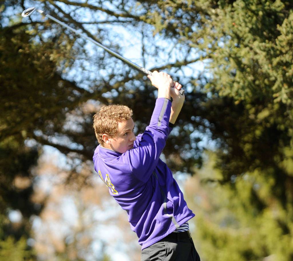 Sequims Liam Payne tees off at hole No. 11 at The Cedars at Dungeness on March 26. Payne shot a 6-over-par 41, third-best on the team, as Sequim topped Kingston. Sequim Gazette photo by Michael Dashiell