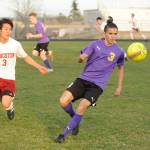 Sequims Ryan Tolberd, right, tracks down the ball before finding teammate Adrian Funston for a goal in the Wolves 4-2 win over Kingston on March 28. Kingstons Ryuzo Kumei, left, defends the play. Sequim Gazette photo by Michael Dashiell
