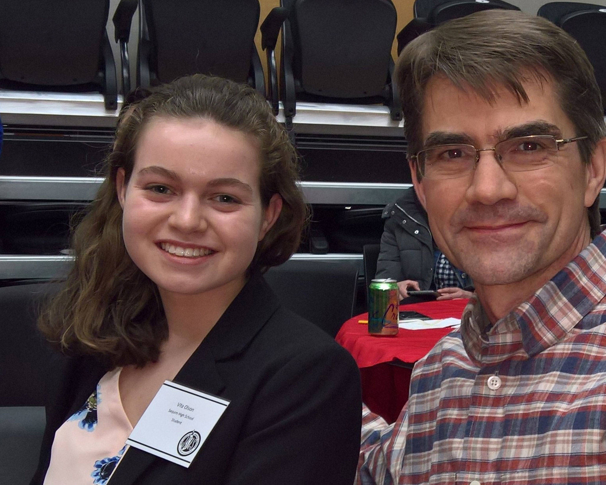 Sequim High Student Vita Olson, pictured with her dad Taylor Olson, advances to the National Junior Science and Humanities Symposium in Albuquerque, N.M., on April 24-28. Shes one of two students representing Washington for their oral presentations after being selected on March 23 at Washingtons symposium in Redmond. Submitted photo