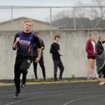 Sequims Logan Laxson breaks from the starting line to place first in the 400-meter race in Sequim on April 11. Sequim Gazette photo by Michael Dashiell